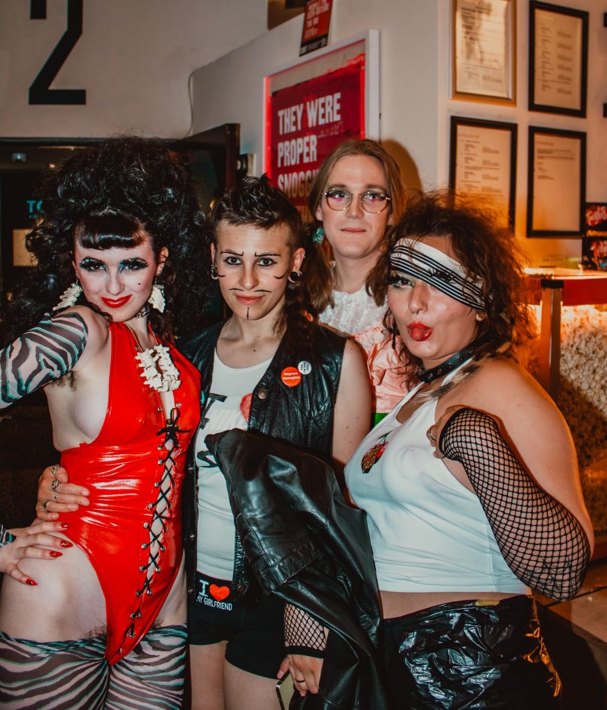 Audience members posing in costume for our Queer Horror Nights screening of FEMALE TROUBLE at Rio Cinema.