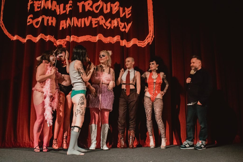 Participants are judged and prizes awarded as part of the anti-fashion parade at the Queer Horror Nights 50th Anniversary screening of FEMALE TROUBLE at Rio Cinema (13 July 2024).