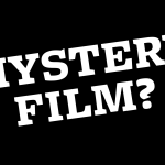 This is a text slide showing the words 'MYSTERY FILM?' in white text on a black background.